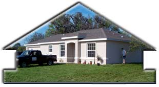 Click for larger image of Paul putting finishing touches on new home landscaping
